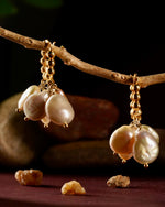 Load image into Gallery viewer, Pearly flawed hoops
