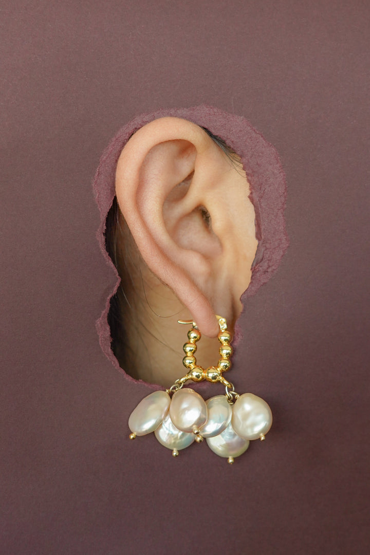 Pearly flawed hoops